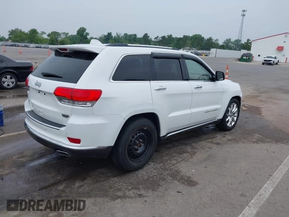 ✅ 2015 Jeep Grand Cherokee Summit • VIN: 1C4RJFJG1FC135935 • Lot: 42494004. Listed on IAAI with 201,553 mi. Free auction sales archive from the USA and detailed vehicle history report at DreamBid. Image 4.