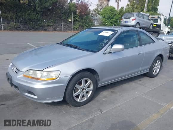 2001 Honda Accord EX с VIN 1HGCG22581A030437, выставлен на аукционе IAAI как лот 43085742 с пробегом 209 619 миль миль и . История ставок и продаж доступна на DreamBid. Изображение 2.