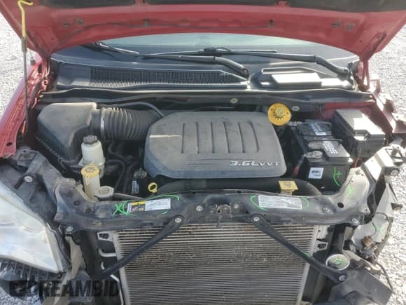 ✅ 2014 Dodge Grand Caravan SE • VIN: 2C4RDGBG2ER137792 • Lot: 86882745. Listed on Copart with 215,077 mi. Free auction sales archive from the USA and detailed vehicle history report at DreamBid. Image 12.