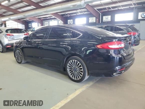 ✅ 2017 Ford Fusion Titanium • VIN: 3FA6P0K96HR124759 • Lot: 61414395. Listed on Copart with 175,655 mi. Free auction sales archive from the USA and detailed vehicle history report at DreamBid. Image 2.