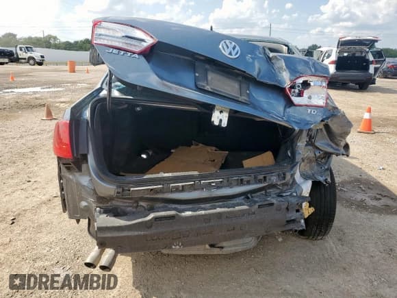 ✅ 2012 Volkswagen Jetta TDI • VIN: 3VW3L7AJ6CM067415 • Лот: 70890395. Опубликован ранее на Copart с пробегом 125 410 миль. Бесплатный доступ к архиву аукционных продаж из США и подробный отчёт об истории автомобиля на DreamBid. Изображение 6.