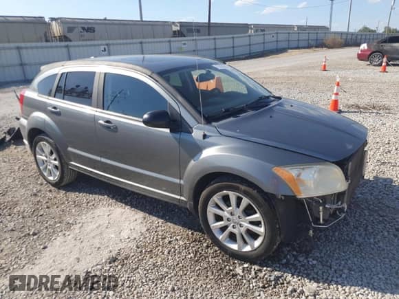 2012 Dodge Caliber SXT Plus with VIN 1C3CDWEA1CD532719, listed as a Copart auction lot 71418365 with 147,306 mi miles and Salvage title. Bid and sale history available at DreamBid. Image 4.