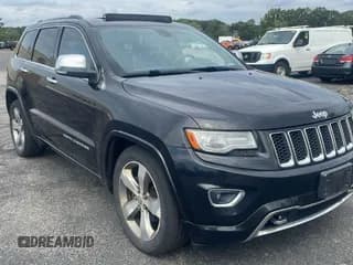 ✅ 2014 Jeep Grand Cherokee Overland • VIN: 1C4RJFCG7EC181541 • Lot: 90742475. Listed on Copart with 226,758 mi. Free auction sales archive from the USA and detailed vehicle history report at DreamBid. Image 1.