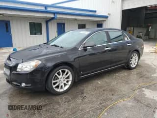✅ 2009 Chevrolet Malibu LTZ • VIN: 1G1ZK57B69F136853 • Lot: 71663625. Listed on Copart with 154,853 mi. Free auction sales archive from the USA and detailed vehicle history report at DreamBid. Image 1.