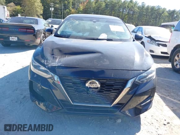 ✅ 2023 Nissan Sentra SR • VIN: 3N1AB8DV7PY269201 • Lot: 43425145. Wystawiony na IAAI z przebiegiem 27 702 mil. Bezpłatny archiwum sprzedaży aukcyjnych z USA i szczegółowy raport historii pojazdu na DreamBid. Zdjęcie 12.