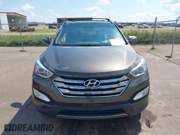 ✅ 2014 Hyundai Santa Fe • VIN: 5XYZUDLB1EG227778 • Lot: 43033757. Listed on IAAI with 135,496 mi. Free auction sales archive from the USA and detailed vehicle history report at DreamBid. Image 12.