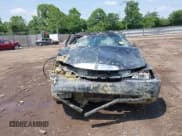 ✅ 1999 Lincoln Town Car Cartier • VIN: 1LNHM83W0XY673738 • Lot: 42437877. Listed on IAAI with 143,018 mi. Free auction sales archive from the USA and detailed vehicle history report at DreamBid. Image 13.