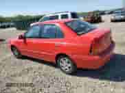 2005 Hyundai Accent GLS z VIN KMHCG45C15U592443, wystawiony jako Copart lot #52291025 z przebiegiem 142 263 mil mil oraz Szkoda całkowita • Salvage title. Historia ofert i sprzedaży dostępna na DreamBid. Obrazek 2.