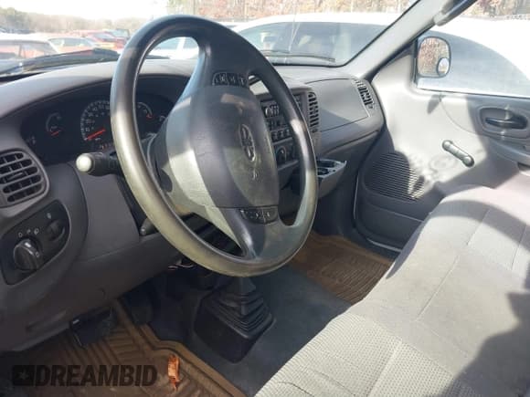 ✅ 2003 Ford F-150 XL • VIN: 2FTRX18W43CA62452 • Lot: 41497879. Listed on IAAI with 125,828 mi. Free auction sales archive from the USA and detailed vehicle history report at DreamBid. Image 5.