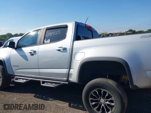 ✅ 2018 Chevrolet Colorado 4WD ZR2 • VIN: 1GCGTEEN9J1285719 • Лот: 42983123. Опубликован ранее на IAAI с пробегом 157 118 миль. Бесплатный доступ к архиву аукционных продаж из США и подробный отчёт об истории автомобиля на DreamBid. Изображение 14.