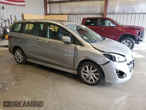 ✅ 2012 Mazda 5 Touring • VIN: JM1CW2CL5C0130020 • Lot: 85781885. Listed on Copart with 139,395 mi. Free auction sales archive from the USA and detailed vehicle history report at DreamBid. Image 4.