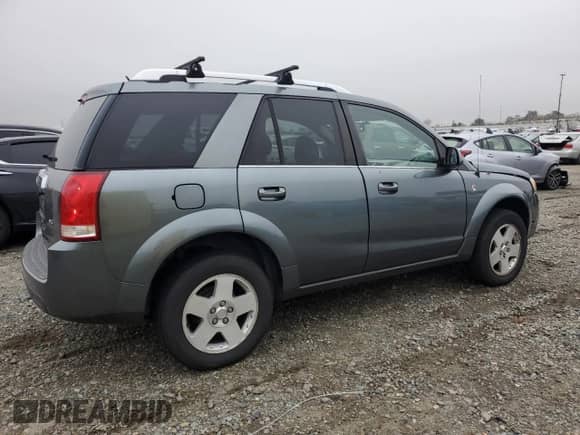 2007 Saturn VUE V6 z VIN 5GZCZ53457S855935, wystawiony jako Copart lot #86215704 z przebiegiem 152 474 mil mil oraz Szkoda całkowita • Salvage title. Historia ofert i sprzedaży dostępna na DreamBid. Obrazek 3.
