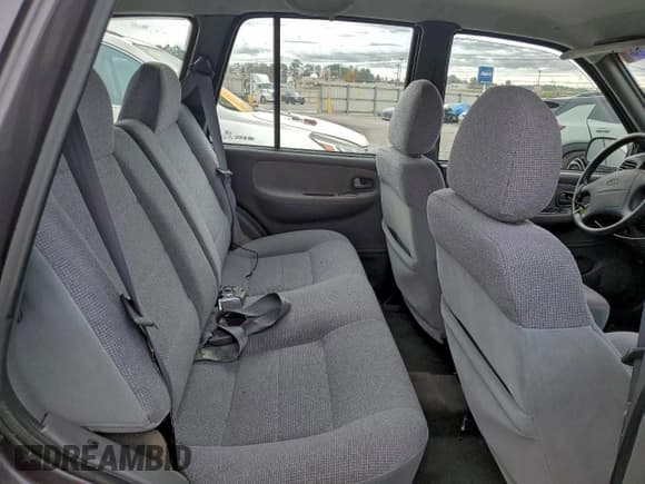 ✅ 2000 Kia Sportage • VIN: KNDJB7232Y5684658 • Лот: 93993405. Опубликован ранее на Copart с пробегом 75 372 миль. Бесплатный доступ к архиву аукционных продаж из США и подробный отчёт об истории автомобиля на DreamBid. Изображение 10.