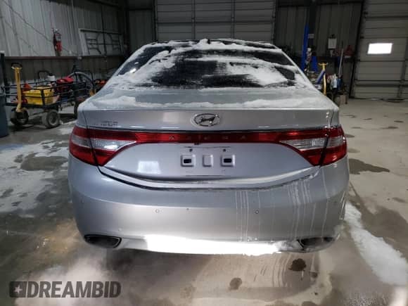 2013 Hyundai Azera z VIN KMHFH4JGXDA329208, wystawiony jako Copart lot #46042495 z przebiegiem 134 543 mil mil oraz Szkoda całkowita • Salvage title. Historia ofert i sprzedaży dostępna na DreamBid. Obrazek 6.