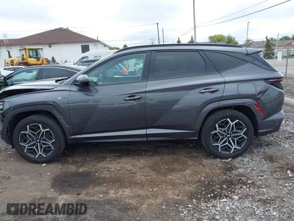 2023 Hyundai Tucson N Line with VIN KM8JFCAE2PU212623, listed as a IAAI auction lot 43440284 with 94,940 mi miles and . Bid and sale history available at DreamBid. Image 14.