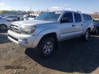 ✅ 2009 Toyota Tacoma PreRunner • VIN: 5TEJU62N29Z593927 • Lot: 74147013. Listed on Copart with 218,234 mi. Free auction sales archive from the USA and detailed vehicle history report at DreamBid. Image 1.