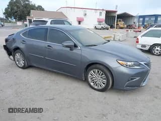 ✅ 2016 Lexus ES 330 • VIN: JTHBK1GG1G2215525 • Lot: 43538769. Listed on IAAI with 100,384 mi. Free auction sales archive from the USA and detailed vehicle history report at DreamBid. Image 1.