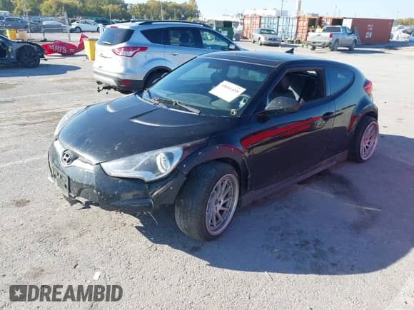 2013 Hyundai Veloster w/Black Int с VIN KMHTC6AD2DU092229, выставлен на аукционе IAAI как лот 43601459 с пробегом 191 710 миль миль и . История ставок и продаж доступна на DreamBid. Изображение 2.