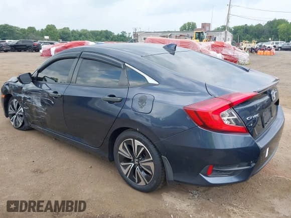 ✅ 2018 Honda Civic EX-T • VIN: JHMFC1F34JX037438 • Lot: 42887459. Listed on IAAI with 107,302 mi. Free auction sales archive from the USA and detailed vehicle history report at DreamBid. Image 17.