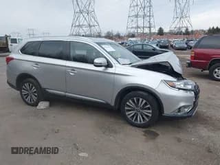 ✅ 2020 Mitsubishi Outlander ES • VIN: JA4AZ3A37LZ029574 • Lot: 41512276. Listed on IAAI with 86,311 mi. Free auction sales archive from the USA and detailed vehicle history report at DreamBid. Image 1.