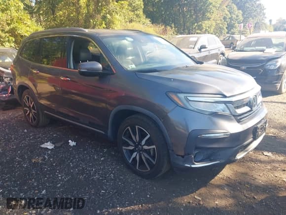 ✅ 2019 Honda Pilot Touring 7-Passenger • VIN: 5FNYF6H67KB011403 • Lot: 43373855. Listed on IAAI with 56,889 mi. Free auction sales archive from the USA and detailed vehicle history report at DreamBid. Image 1.