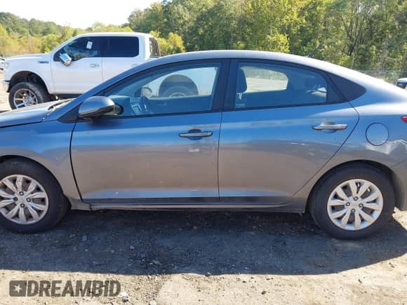 2019 Hyundai Accent SE z VIN 3KPC24A38KE080617, wystawiony jako IAAI lot #43469463 z przebiegiem 156 782 mil mil oraz . Historia ofert i sprzedaży dostępna na DreamBid. Obrazek 14.