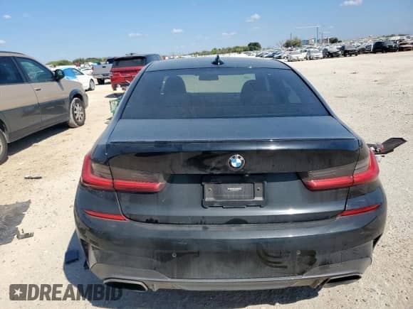 2021 BMW 3 Series M340i with VIN 3MW5U7J00M8B57425, listed as a Copart auction lot 86184065 with 58,139 mi miles and Salvage title. Bid and sale history available at DreamBid. Image 6.