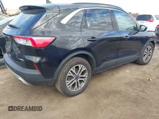 ✅ 2020 Ford Escape SEL • VIN: 1FMCU9H68LUA74158 • Lot: 43557205. Listed on IAAI with 56,963 mi. Free auction sales archive from the USA and detailed vehicle history report at DreamBid. Image 4.