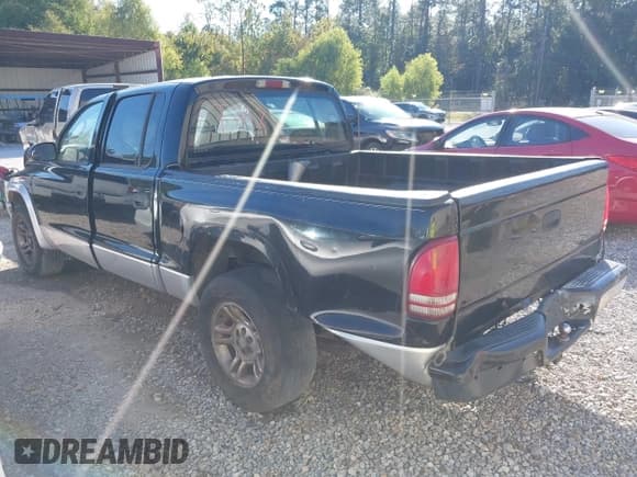 ✅ 2003 Dodge Dakota SLT • VIN: 1D7HL48X93S151422 • Lot: 40661577. Wystawiony na IAAI z przebiegiem 238 586 mil. Bezpłatny archiwum sprzedaży aukcyjnych z USA i szczegółowy raport historii pojazdu na DreamBid. Zdjęcie 3.