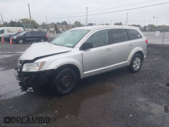 2012 Dodge Journey American Value with VIN 3C4PDCAB4CT154190, listed as a IAAI auction lot 43485900 with 161,305 mi miles and . Bid and sale history available at DreamBid. Image 2.