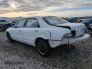 ✅ 1999 Mazda 626 ES • VIN: 1YVGF22C9X5887587 • Лот: 46346305. Опубликован ранее на Copart с пробегом 92 715 миль. Бесплатный доступ к архиву аукционных продаж из США и подробный отчёт об истории автомобиля на DreamBid. Изображение 2.