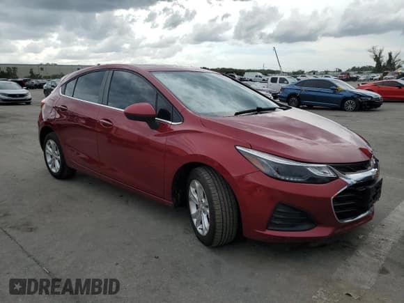 ✅ 2019 Chevrolet Cruze LT • VIN: 3G1BE6SM9KS601831 • Lot: 56832693. Listed on Copart with 55,257 mi. Free auction sales archive from the USA and detailed vehicle history report at DreamBid. Image 4.