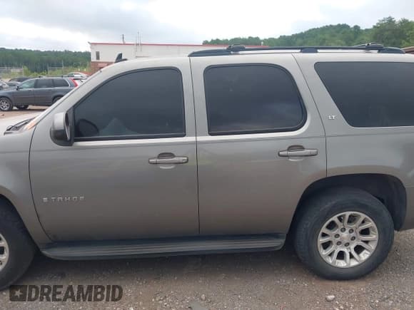 ✅ 2009 Chevrolet Tahoe 2LT • VIN: 1GNFC23019R157707 • Lot: 42751675. Listed on IAAI with 245,494 mi. Free auction sales archive from the USA and detailed vehicle history report at DreamBid. Image 14.
