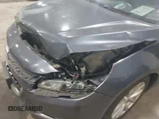 2015 Chevrolet Malibu LT z VIN 1G11D5SL2FF315314, wystawiony jako IAAI lot #43144738 z przebiegiem 213 967 mil mil oraz . Historia ofert i sprzedaży dostępna na DreamBid. Obrazek 6.