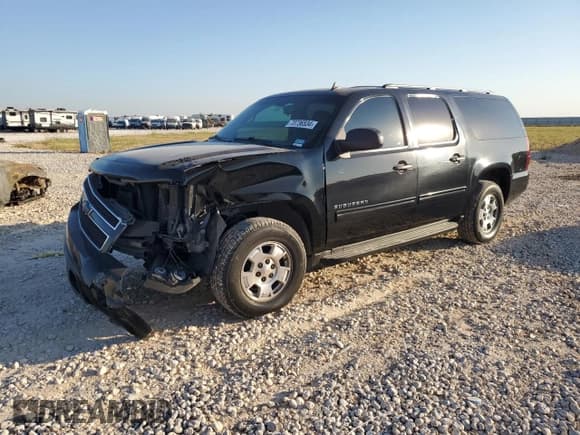✅ 2009 Chevrolet Suburban LS • VIN: 1GNFC16J79R296206 • Lot: 73736534. Listed on Copart with 415,731 mi. Free auction sales archive from the USA and detailed vehicle history report at DreamBid. Image 1.