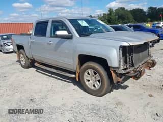 2017 Chevrolet Silverado 1500 LT z VIN 3GCPCREH3HG414129, wystawiony jako IAAI lot #43456728 z przebiegiem 163 489 mil mil oraz . Historia ofert i sprzedaży dostępna na DreamBid. Obrazek 1.