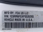 ✅ 2023 Ram 1500 Tradesman • VIN: 1C6RR6FGXPS535265 • Lot: 41474268. Wystawiony na IAAI z przebiegiem 10 989 mil. Bezpłatny archiwum sprzedaży aukcyjnych z USA i szczegółowy raport historii pojazdu na DreamBid. Zdjęcie 9.