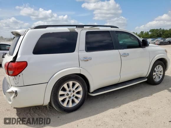 ✅ 2013 Toyota Sequoia Platinum • VIN: 5TDYY5G14DS046988 • Lot: 70848725. Listed on Copart with 297,145 mi. Free auction sales archive from the USA and detailed vehicle history report at DreamBid. Image 3.