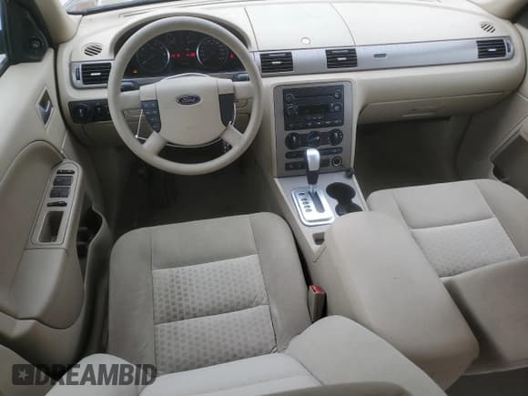 ✅ 2005 Ford Five Hundred SE • VIN: 1FAFP231X5G107583 • Lot: 78573224. Wystawiony na Copart z przebiegiem 97 849 mil. Bezpłatny archiwum sprzedaży aukcyjnych z USA i szczegółowy raport historii pojazdu na DreamBid. Zdjęcie 8.