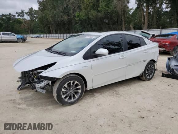 2021 Toyota Prius L Eco with VIN JTDKAMFU4M3139334, listed as a Copart auction lot 84025305 with 59,418 mi miles and Salvage title. Bid and sale history available at DreamBid. Image 1.