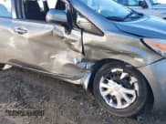 ✅ 2014 Nissan Note S • VIN: 3N1CE2CP3EL436812 • Lot: 41271500. Wystawiony na IAAI z przebiegiem 49 769 mil. Bezpłatny archiwum sprzedaży aukcyjnych z USA i szczegółowy raport historii pojazdu na DreamBid. Zdjęcie 6.