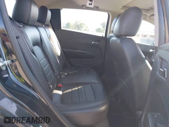 2013 Chevrolet Sonic RS z VIN 1G1JG6SBXD4133244, wystawiony jako IAAI lot #43232727 z przebiegiem 143 286 mil mil oraz . Historia ofert i sprzedaży dostępna na DreamBid. Obrazek 8.