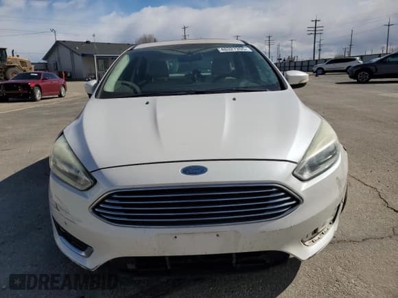 ✅ 2015 Ford Focus Titanium • VIN: 1FADP3N25FL211247 • Lot: 48327205. Wystawiony na Copart z przebiegiem 101 556 mil. Bezpłatny archiwum sprzedaży aukcyjnych z USA i szczegółowy raport historii pojazdu na DreamBid. Zdjęcie 5.