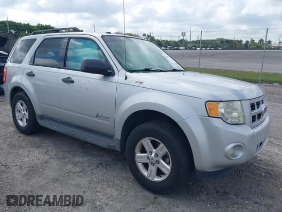 ✅ 2011 Ford Escape Hybrid • VIN: 1FMCU4K3XBKC60103 • Lot: 42048614. Wystawiony na IAAI z przebiegiem 125 354 mil. Bezpłatny archiwum sprzedaży aukcyjnych z USA i szczegółowy raport historii pojazdu na DreamBid. Zdjęcie 1.
