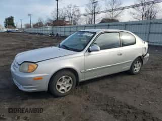 2005 Hyundai Accent GLS with VIN KMHCG35C05U343447, listed as a Copart auction lot 50418275 with 145,843 mi miles and Salvage title. Bid and sale history available at DreamBid. Image 1.