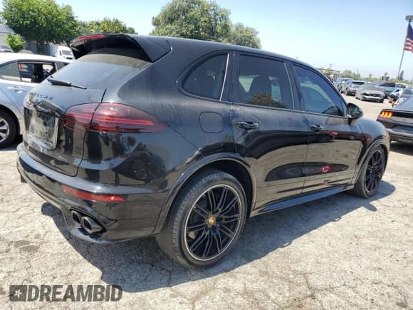 ✅ 2016 Porsche Cayenne GTS • VIN: WP1AD2A28GLA76562 • Лот: 64137385. Опубликован ранее на Copart с пробегом 77 414 миль. Бесплатный доступ к архиву аукционных продаж из США и подробный отчёт об истории автомобиля на DreamBid. Изображение 3.