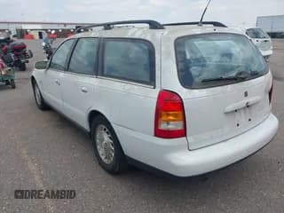 ✅ 2000 Saturn LW • VIN: 1G8JU82F8YY643468 • Лот: 42616225. Опубликован ранее на IAAI с пробегом 131 137 миль. Бесплатный доступ к архиву аукционных продаж из США и подробный отчёт об истории автомобиля на DreamBid. Изображение 3.