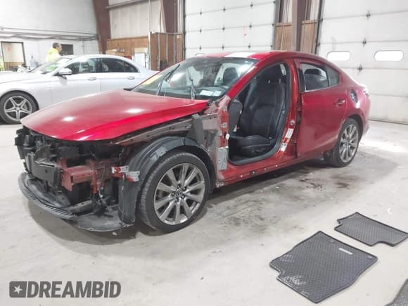 ✅ 2021 Mazda 3 • VIN: JM1BPBDL0M1334811 • Lot: 43777630. Listed on IAAI with 57,584 mi. Free auction sales archive from the USA and detailed vehicle history report at DreamBid. Image 2.