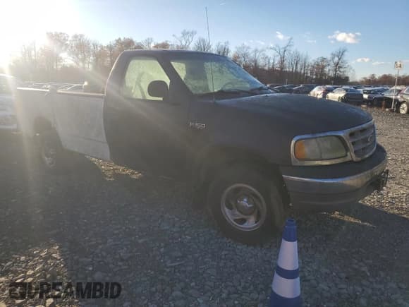 ✅ 2003 Ford F-150 XL • VIN: 1FTRF182X3NA77709 • Lot: 91856995. Listed on Copart with Not provided. Free auction sales archive from the USA and detailed vehicle history report at DreamBid. Image 4.