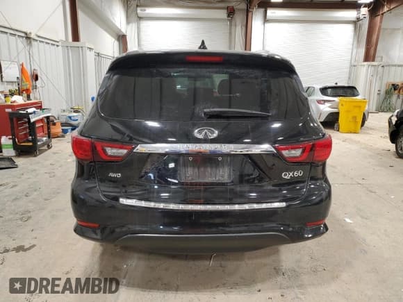 ✅ 2020 Infiniti QX60 Signature Edition • VIN: 5N1DL0MM4LC501445 • Lot: 48206895. Listed on Copart with 102,523 mi. Free auction sales archive from the USA and detailed vehicle history report at DreamBid. Image 6.